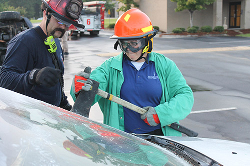 EMS students work to free victim from car